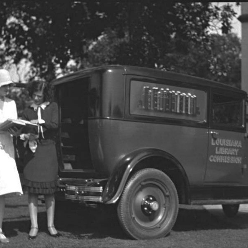 Patrons pose next to the Concordia Parish bookmobile circa 1927.
